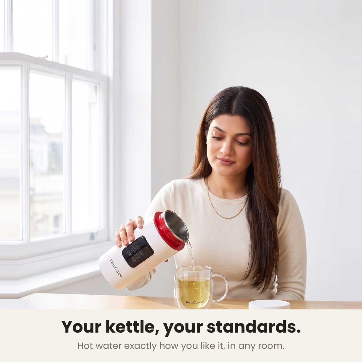 InstaCuppa Portable Electric Kettle 500 ml with Temperature Control - White - pouring hot water into a glass mug of tea