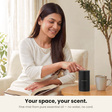 InstaCuppa Rechargeable Aroma Oil Diffuser - your space, your scent: a woman taps the touch top to switch it on; fine mist from pure essential oil, no water, no cord