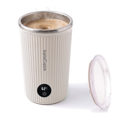 InstaCuppa Self Stirring Mug 300 ml - Light Beige - the mug alone on white, lid off and leaning beside it, a coffee swirl inside, display reading 62°C