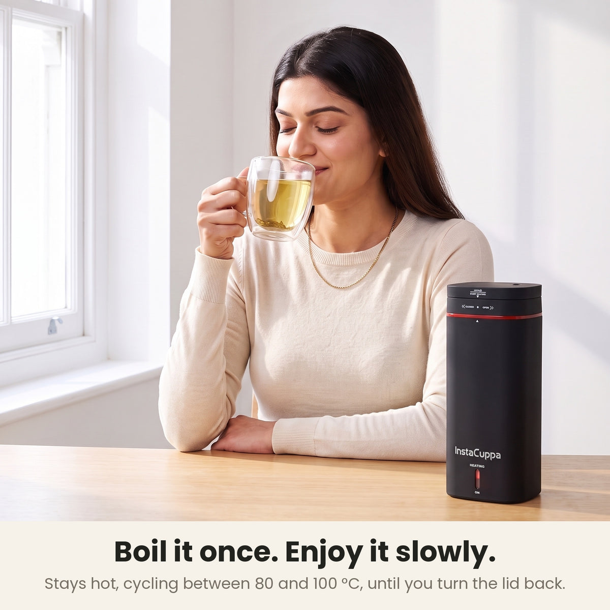 InstaCuppa Portable Electric Kettle 500 ml - Black - woman enjoying green tea at a desk