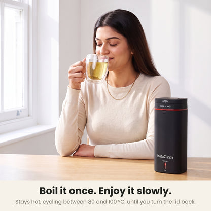 InstaCuppa Portable Electric Kettle 500 ml - Black - woman enjoying green tea at a desk